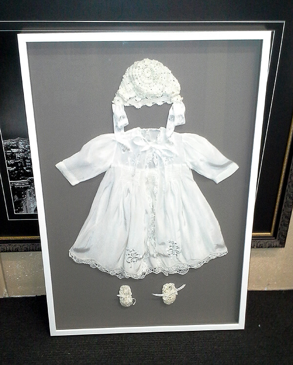 Christening-gown-shadow-box-frame hand-stitched antique lace christening gown in shadow box frame