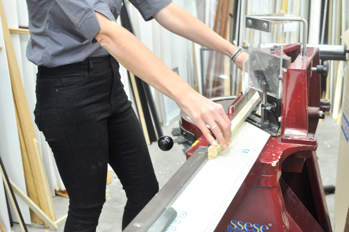 Guillotine cutting picture frame moulding