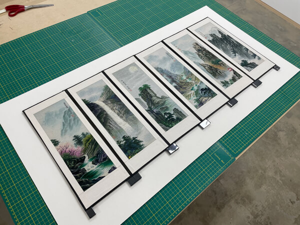 Matboard layout with mulit-openings for silks