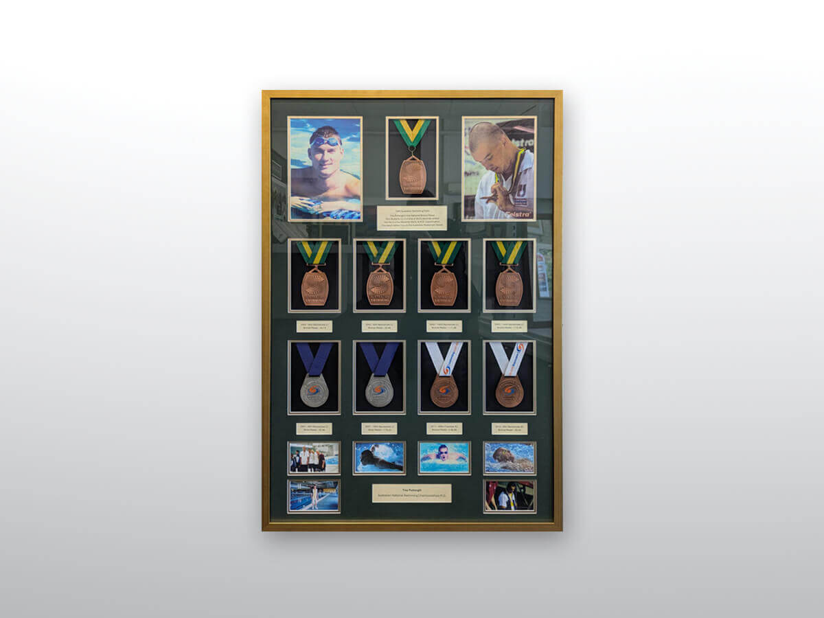 Framed olympic medals